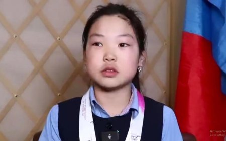 Есөн настай охин гар дээрээ 290 суниаж, рекорд тогтоожээ